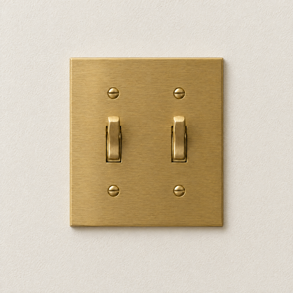 2-Gang Toggle Switch in Unlacquered Brass, front view