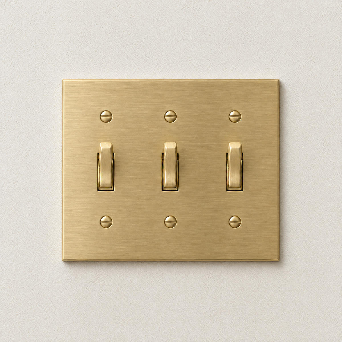 3-Gang Toggle Switch in Satin Brass