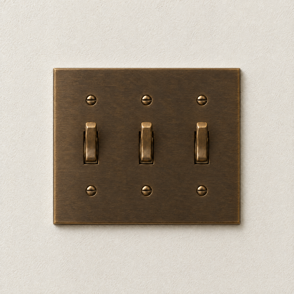 3-Gang Toggle Switch in Aged Brass